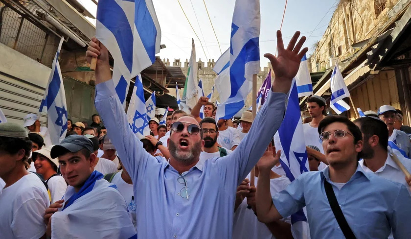 Israeli flag march on Jerusalem Day, on Sunday. Credit: HAZEM BADER / AFP