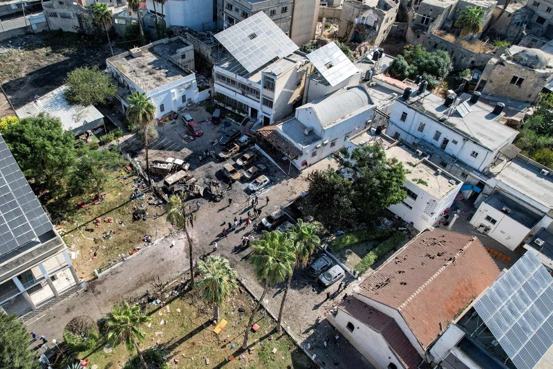 An aerial view of the complex housing the Ahli Arab hospital in Gaza City after an explosion on the hospital grounds that killed hundreds, according to Palestinian officials. Unraveling the facts behind the explosion has been made difficult because of swarms of social media accounts spreading false information about the explosion. Shadi Al-Tabatibi/AFP via Getty Images